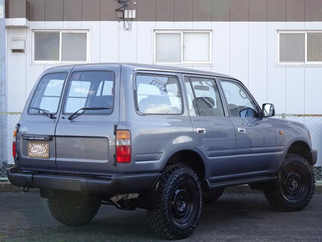 ランドクルーザー80 GX HZJ81V 後期型純正ナロー リア観音ドア グレーメタリック 輸出仕様 5速マニュアル パートタイム4WD 3インチリフトUP PW集中ドアロック 前後バンパーサイドSラプターライナー新品255MT(35枚目)