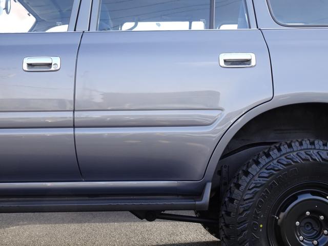 ランドクルーザー80 GX HZJ81V 後期型純正ナロー リア観音ドア グレーメタリック 輸出仕様 5速マニュアル パートタイム4WD 3インチリフトUP PW集中ドアロック 前後バンパーサイドSラプターライナー新品255MT(60枚目)