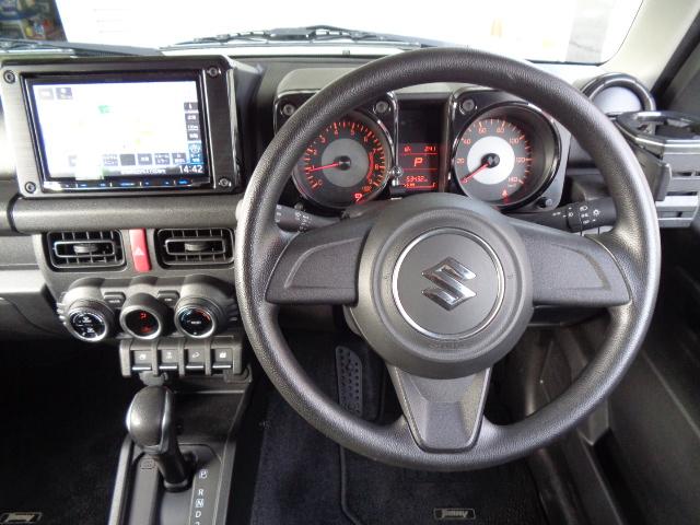 ジムニー XL 4WD ETC ナビ スマートキー 電動格納ミラー シートヒーター AT 盗難防止システム 衝突安全ボディ ABS ESC エアコン パワーステアリング パワーウィンドウ 運転席エアバッグ(3枚目)