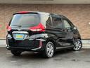 フリードハイブリッド ハイブリッド・Ｇホンダセンシング　保証付　禁煙車　衝突軽減ブレーキ　両側電動スライドドア　９型ナビ　フリップダウンモニター　フルセグＴＶ　Ｂモニター　スマートキー　ブルートゥース　追従型クルコン　ビルトインＥＴＣ　ＬＥＤライト（8枚目）