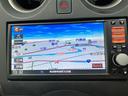 ノート Ｘ　ナビ　ＴＶ　アルミホイール　スマートキー　アイドリングストップ　電動格納ミラー　ＣＶＴ　盗難防止システム　衝突安全ボディ　ＡＢＳ　ＣＤ　ミュージックプレイヤー接続可　エアコン　パワーステアリング（3枚目）
