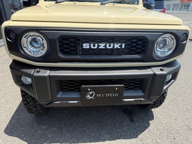 ジムニー XC 4型 リヤパーキングセンサー オリジナルカスタム 16インチ特注カラーホイール ホワイトレタータイヤ 社外フロントグリル LEDウィンカー LEDヘッドランプ クルーズコントロール シートヒーター(26枚目)