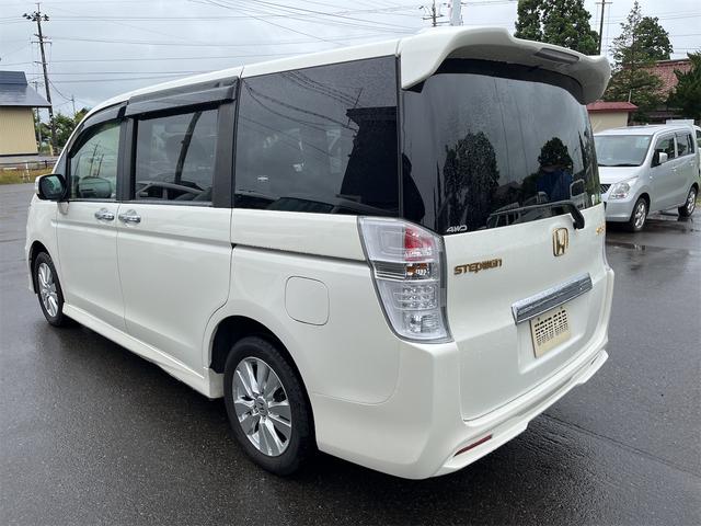 ステップワゴンスパーダ Ｚ　ＨＤＤナビエディション　４ＷＤ　ＥＴＣ　バックカメラ　ナビ　ＴＶ　両側電動スライドドア　ＨＩＤ　スマートキー　後席モニター　３列シート　ＡＴ　アルミホイール　ＣＤ　ＤＶＤ再生　ＵＳＢ　盗難防止システム　衝突安全ボディ　ＡＢＳ（15枚目）