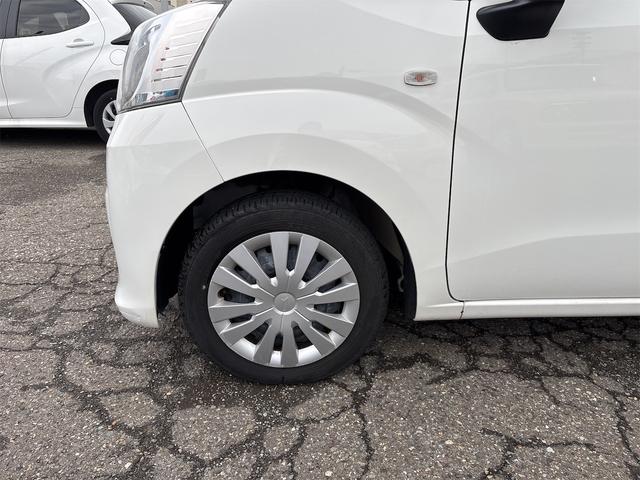 ムーヴ Ｌ　純正ＣＤチューナー　２ＷＤ　整備記録簿　キーレスエントリー　ＵＶカットプライバシーガラス　分割可倒式リヤシート　パワーウインドウ　集中ドアロック　リヤワイパー（27枚目）
