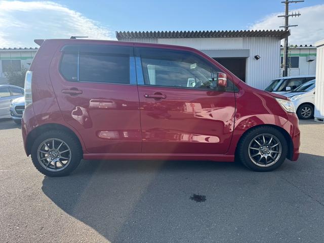 ワゴンRスティングレー T 102980km 社外ナビ 地デジTV バックカメラ ステアスイッチ プッシュスタート スマートキー アイドリングストップ HIDライト フォグランプ ローダウン 社外マフラー 社外アルミホイール(4枚目)