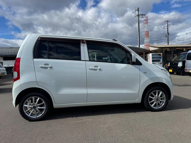 ワゴンR FX 90531km 4WD AC PS PW SRSエアバック ABS キーレスキー シートヒーター 盗難防止システム 衝突安全ボディ ベンチシート フルフラット CD 取扱説明書 社外アルミホイール(4枚目)