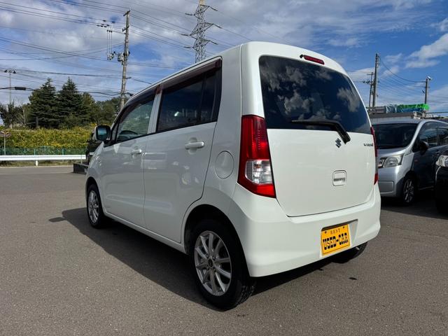 ワゴンR FX 90531km 4WD AC PS PW SRSエアバック ABS キーレスキー シートヒーター 盗難防止システム 衝突安全ボディ ベンチシート フルフラット CD 取扱説明書 社外アルミホイール(9枚目)