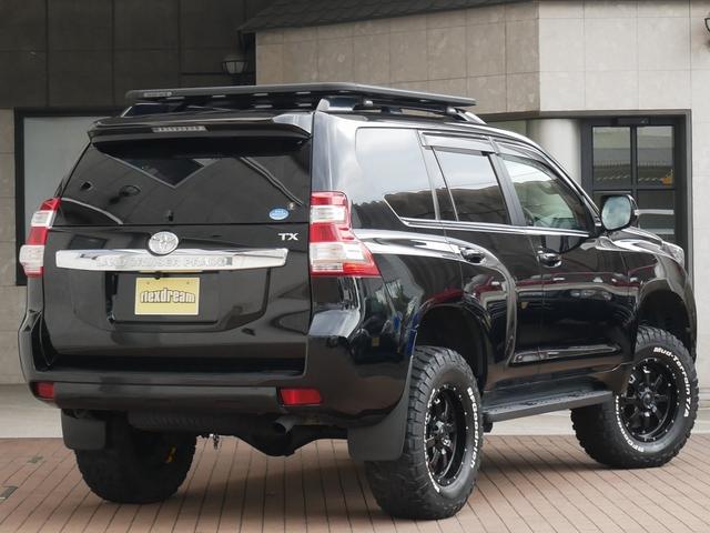 TX 中古車金利1.9パーセント TX 2.7Lガソリン 7人乗り 2インチUP オールドマンエミューコイル&ショック新品 グリルガード RHINOフラットラック NITTOトレイルグラップラーMT ブラッ(3枚目)