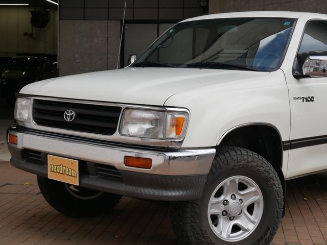 Ｔ１００ ＳＲ５　エクストラキャブ　買取直販　純正ホワイト　ロール式トノカバー　ＦＡＬＫＥＮワイルドピークＡＴ　トヨタ純正１６インチＡＷ　ベンチシート６人乗り　ＬＥＣＡＲＲＡステアリング　カロッツェリア７インチナビ　バックカメラ　サンル（7枚目）