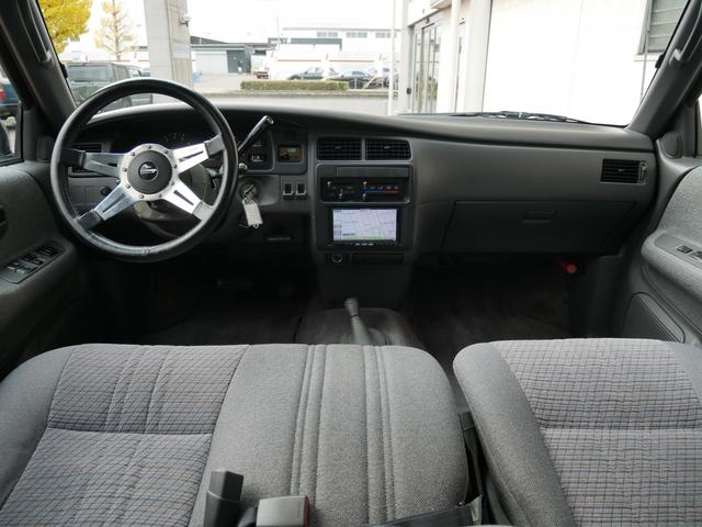 Ｔ１００ ＳＲ５　エクストラキャブ　買取直販　純正ホワイト　ロール式トノカバー　ＦＡＬＫＥＮワイルドピークＡＴ　トヨタ純正１６インチＡＷ　ベンチシート６人乗り　ＬＥＣＡＲＲＡステアリング　カロッツェリア７インチナビ　バックカメラ　サンル（13枚目）