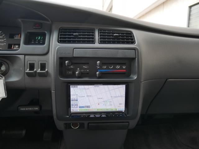 Ｔ１００ ＳＲ５　エクストラキャブ　買取直販　純正ホワイト　ロール式トノカバー　ＦＡＬＫＥＮワイルドピークＡＴ　トヨタ純正１６インチＡＷ　ベンチシート６人乗り　ＬＥＣＡＲＲＡステアリング　カロッツェリア７インチナビ　バックカメラ　サンル（14枚目）