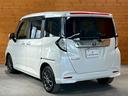ルーミー カスタムG 禁煙車/後期モデル/4WD/寒冷地仕様/エンジンスターター/スタッドレス付属/フリップダウンモニター/カロッツェリア9型ナビ/全周囲モニター/Bluetooth接続/シートヒーター/ドライブレコーダー 中古車画像_2
