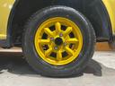 　禁煙車／５速マニュアル／カラーパンプキンイエロー／アルミホイール／エアコン／スペアタイヤ付属（14枚目）