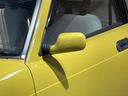 　禁煙車／５速マニュアル／カラーパンプキンイエロー／アルミホイール／エアコン／スペアタイヤ付属（55枚目）