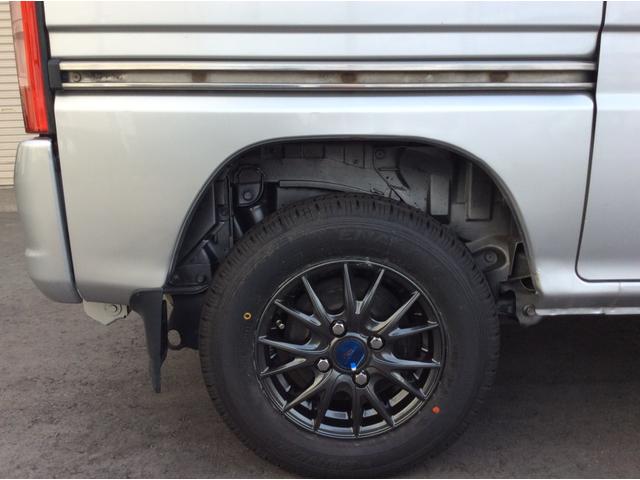 トランスポーター マニュアル切り替え4WD走行86000kmパワステエアコンパワステパワーウィンド運転席エアバック衝突安全ボディーキーレス純正オーディオ純正ドアバイザーライトレベライザー社外カロッツェリアHDDナビ(22枚目)