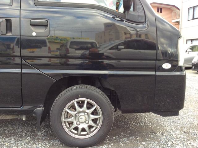 サンバーバン ディアス　オートマ４ＷＤ・走行８９３３７ｋｍ・ＡＣ・ＰＳ・ＰＷ・エアバック・リヤヒーター・電角ミラー・キーレス・ライトレベライザー・Ａ／Ｔパワー・純正ドアバイザー・フロアマット・社外１２インチアルミ冬タイヤ装着（24枚目）