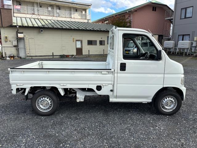 アクティトラック ＳＤＸ　マニュアル４ＷＤ・走行４１０００ｋｍ・車検８年４月・パワステ・エアＢ・ライトレベライザー・純正フロアーマット・純正ゲートプロテクター・アオリチェーン・作業灯・純正１２インチスチールホイル・夏タイヤ装着（13枚目）