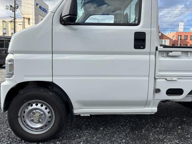 アクティトラック ＳＤＸ　マニュアル４ＷＤ・走行４１０００ｋｍ・車検８年４月・パワステ・エアＢ・ライトレベライザー・純正フロアーマット・純正ゲートプロテクター・アオリチェーン・作業灯・純正１２インチスチールホイル・夏タイヤ装着（35枚目）