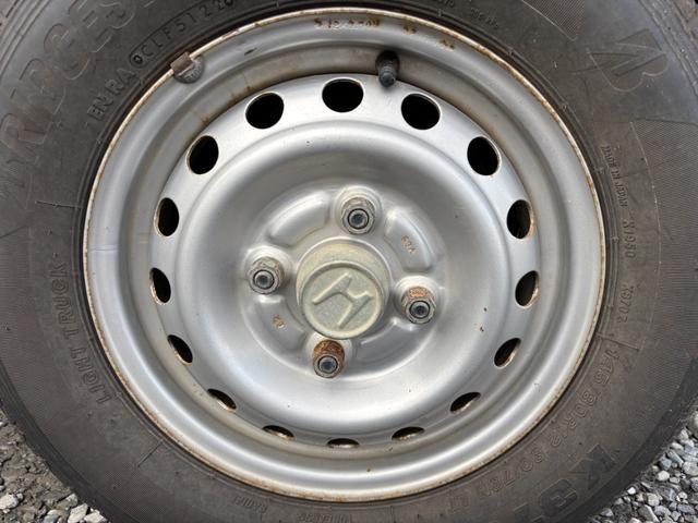 アクティトラック ＳＤＸ　マニュアル４ＷＤ・走行４１０００ｋｍ・車検８年４月・パワステ・エアＢ・ライトレベライザー・純正フロアーマット・純正ゲートプロテクター・アオリチェーン・作業灯・純正１２インチスチールホイル・夏タイヤ装着（49枚目）