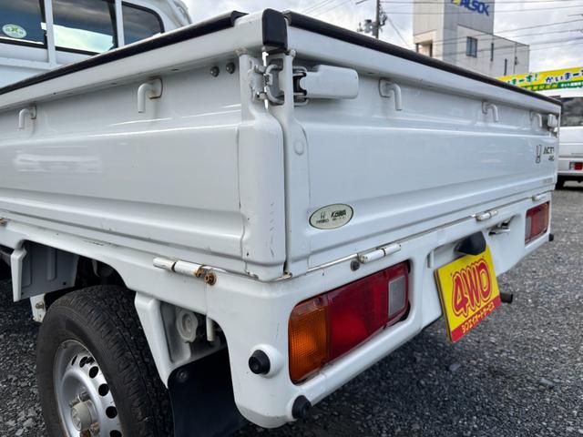 アクティトラック ＳＤＸ　マニュアル４ＷＤ・走行４１０００ｋｍ・車検８年４月・パワステ・エアＢ・ライトレベライザー・純正フロアーマット・純正ゲートプロテクター・アオリチェーン・作業灯・純正１２インチスチールホイル・夏タイヤ装着（54枚目）