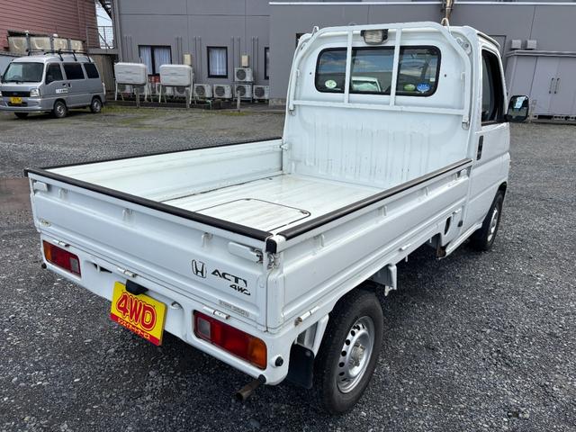 アクティトラック ＳＤＸ　マニュアル４ＷＤ・走行４１０００ｋｍ・車検８年４月・パワステ・エアＢ・ライトレベライザー・純正フロアーマット・純正ゲートプロテクター・アオリチェーン・作業灯・純正１２インチスチールホイル・夏タイヤ装着（59枚目）