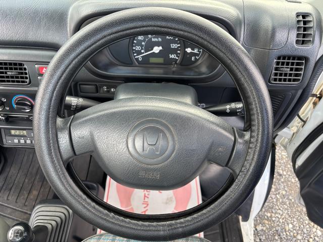 アクティトラック ＳＤＸ　マニュアル４ＷＤ・走行４１０００ｋｍ・車検８年４月・パワステ・エアＢ・ライトレベライザー・純正フロアーマット・純正ゲートプロテクター・アオリチェーン・作業灯・純正１２インチスチールホイル・夏タイヤ装着（79枚目）