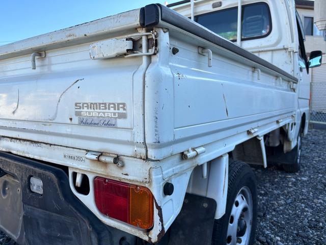 サンバートラック TB マニュアル切り替え4WD・走行35200km・エアコン無・パワステ有・エアバック無・純正フロアマット・ドアバイザ-・オーディオ・ゲートチェーン・純正12インチホイル夏タイヤ装着(25枚目)