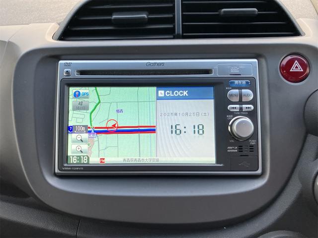 フィット G・10thアニバーサリー ETC バックカメラ ナビ オートライト スマートキー CVT 盗難防止システム 衝突安全ボディ 記録簿 ABS CD DVD再生 USB エアコン パワーステアリング パワーウィンドウ(6枚目)