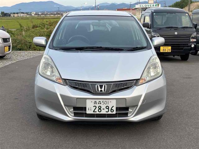 フィット G・10thアニバーサリー ETC バックカメラ ナビ オートライト スマートキー CVT 盗難防止システム 衝突安全ボディ 記録簿 ABS CD DVD再生 USB エアコン パワーステアリング パワーウィンドウ(12枚目)