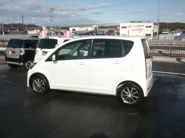 ムーヴ カスタム　ＸＣ　エディション　４ＷＤ　衝突安全ボディー　盗難防止付き　運転席助手席エアバック　ＡＢＳブレーキ　電各ミラー　スマートキー　ＨＩＤライト　純正オーディオ付き５ドア４人乗り　プライバシーガラスベンチシート基本装備フル装備（2枚目）