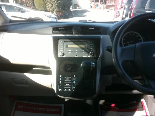 ｅＫワゴン Ｍ　４ＷＤ　基本装備フル装備　衝突安全ボディー盗難防止付き　運転席助手席エアバック　ＡＢＳブレーキ　アイドリングストップ　寒冷地仕様　純正オーディオ付き　プライバシーガラス　５ドア４人乗り（4枚目）