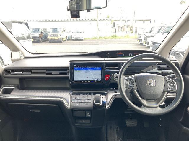 ステップワゴンスパーダ スパーダハイブリッド　Ｇ・ＥＸ　ホンダセンシング　追突防止装置　誤発進防止装置　純正９インチフルセグＳＤナビ　Ｂｌｕｔｅｔｏｏｔｈ接続　後席モニター　バックカメラ　両側自動ドア　レーダークルーズ　両席シートヒーター　ＬＥＤオートライト　横滑り防止装置（7枚目）