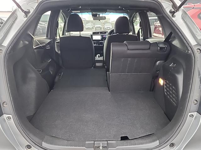 フィットハイブリッド Ｓパッケージ　４ＷＤ　ワンオーナー　純正フルセグナビ　純正ＣＤ　ＤＶＤ再生　Ｂｌｕｔｅｔｏｏｔｈ接続　ＥＴＣ　バックカメラ　ＬＥＤオートライト　クルーズコントロール　ステアスイッチ　サイドエアバッグ　横滑り防止装置（41枚目）