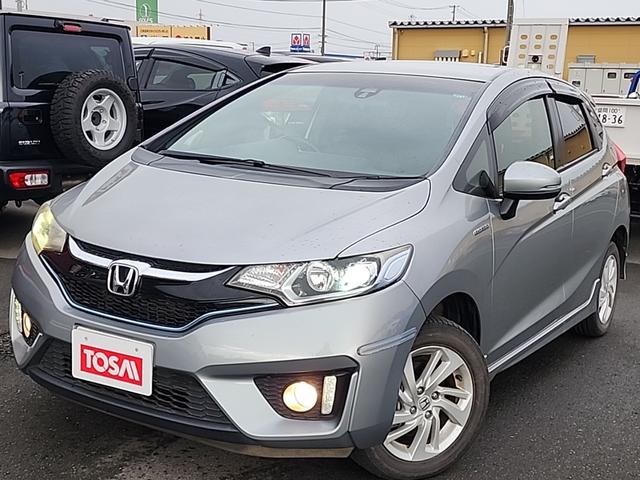 フィットハイブリッド Ｓパッケージ　４ＷＤ　ワンオーナー　純正フルセグナビ　純正ＣＤ　ＤＶＤ再生　Ｂｌｕｔｅｔｏｏｔｈ接続　ＥＴＣ　バックカメラ　ＬＥＤオートライト　クルーズコントロール　ステアスイッチ　サイドエアバッグ　横滑り防止装置（43枚目）