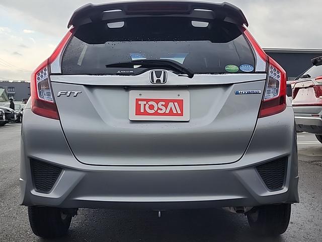 フィットハイブリッド Ｓパッケージ　４ＷＤ　ワンオーナー　純正フルセグナビ　純正ＣＤ　ＤＶＤ再生　Ｂｌｕｔｅｔｏｏｔｈ接続　ＥＴＣ　バックカメラ　ＬＥＤオートライト　クルーズコントロール　ステアスイッチ　サイドエアバッグ　横滑り防止装置（48枚目）