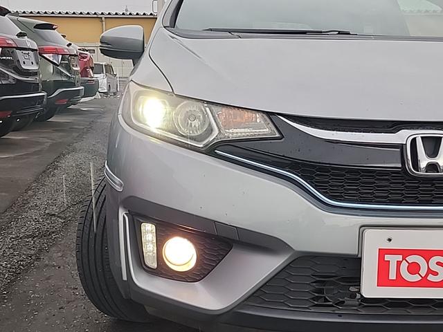 フィットハイブリッド Ｓパッケージ　４ＷＤ　ワンオーナー　純正フルセグナビ　純正ＣＤ　ＤＶＤ再生　Ｂｌｕｔｅｔｏｏｔｈ接続　ＥＴＣ　バックカメラ　ＬＥＤオートライト　クルーズコントロール　ステアスイッチ　サイドエアバッグ　横滑り防止装置（51枚目）