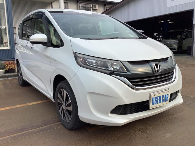 フリード Ｇ・ホンダセンシング　４ＷＤ　ナビ　後席モニタ　バックカメラ　オートクルーズコントロール　レーンアシスト　アイドリングストップ　衝突安全ボディ　衝突被害軽減システム　スマートキー　横滑り防止　シートヒーター（6枚目）