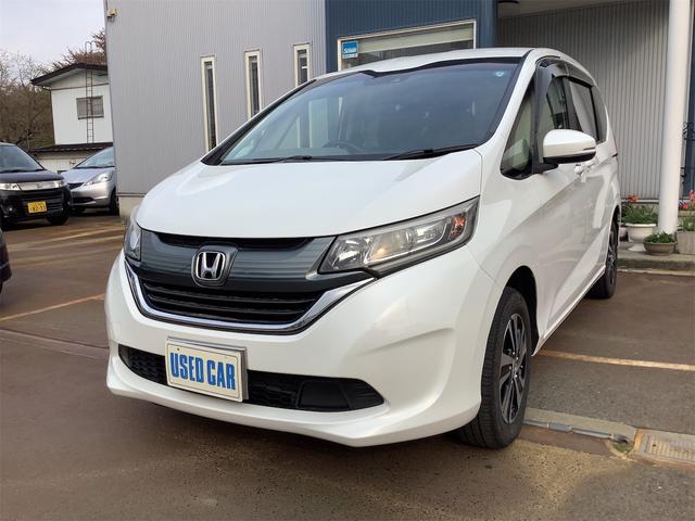 フリード Ｇ・ホンダセンシング　４ＷＤ　ナビ　後席モニタ　バックカメラ　オートクルーズコントロール　レーンアシスト　アイドリングストップ　衝突安全ボディ　衝突被害軽減システム　スマートキー　横滑り防止　シートヒーター（7枚目）
