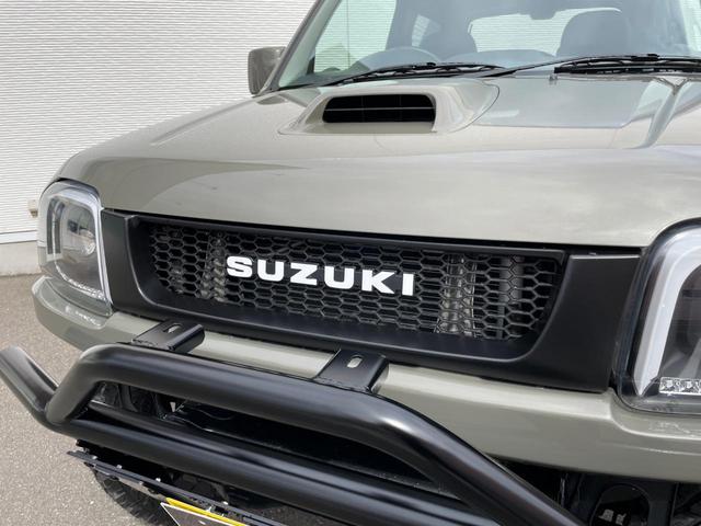 ジムニー スズキ ランドベンチャー ｎｅｗｐａｉｎｔ エメラルドグレーメタリック リフトｕｐ ｆｒバンパー ルーフレール マッドブラック塗装 ｓｕｚｙｓｐｏｒｔｓバンパー サイドステップ メッシュグリル ジオランダーｍ ｔ新品タイヤの中古車詳細 中古車検索