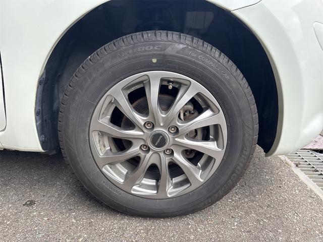 マーチ １２Ｇ　ＦＯＵＲ　プッシュスタート　４ＷＤ　ナビＴＶ　社外アルミホイール　スマートキー　電動格納ミラー　ＣＶＴ　盗難防止システム　衝突安全ボディＡＢＳ　エアコン　パワーステアリング　パワーウィンドウ　エンジンスターター（20枚目）