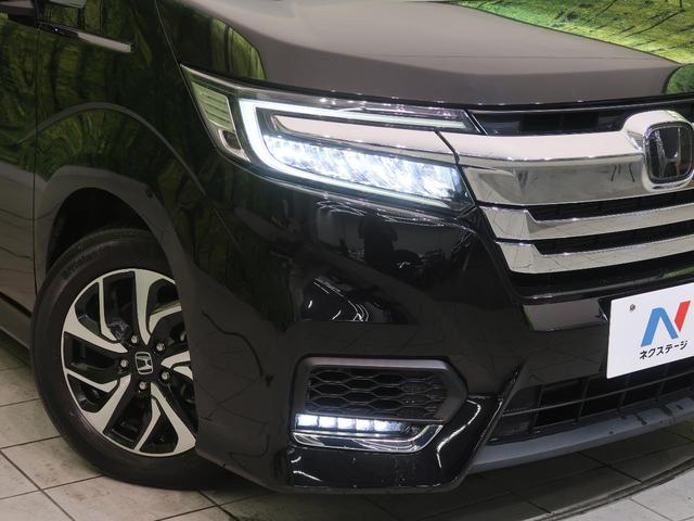 スパーダ ホンダセンシング 純正9型ナビ フリップダウンモニター 禁煙車 両側電動スライドドア 衝突軽減装置 バックカメラ Bluetooth ドライブレコーダー ETC アダプティブクルーズコントロール 誤発進抑制機能(14枚目)