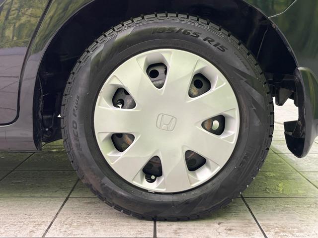 G Lパッケージ 電動スライドドア 禁煙車 三列シート キーレス オートエアコン 純正オーディオ 盗難防止装置 プライバシーガラス パワーウィンドウ パワーステアリング 電動格納ミラー CD再生 AUX(28枚目)