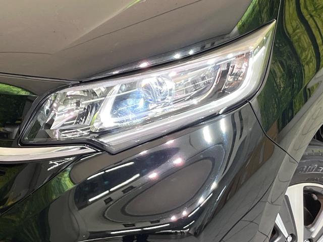 フリード Ｇ・ホンダセンシング　両側電動ドア　純正ナビ　バックカメラ　衝突軽減　レーダークルーズ　シートヒーター　コーナーセンサー　スマートキー　ＬＥＤヘッド　ＥＴＣ　オートハイビーム　車線逸脱警報　誤発進抑制機能　横滑り防止装置（13枚目）