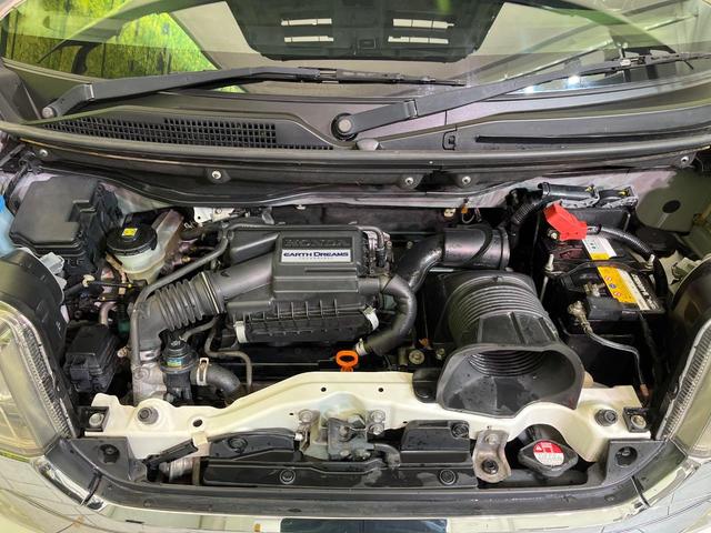 N-BOXカスタム G ターボSSパッケージ 両側電動ドア 8型ナビ バックカメラ 衝突軽減装置 シートヒーター スマートキー HIDヘッド ETC クルコン オートライト オートエアコン 純正15インチAW Bluetooth再生 フォグ(18枚目)