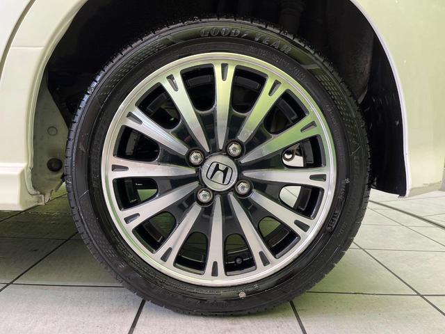 N-BOXカスタム G ターボSSパッケージ 両側電動ドア 8型ナビ バックカメラ 衝突軽減装置 シートヒーター スマートキー HIDヘッド ETC クルコン オートライト オートエアコン 純正15インチAW Bluetooth再生 フォグ(26枚目)