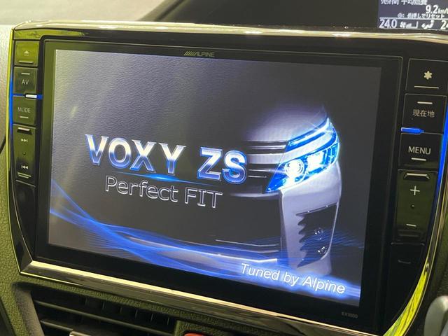 ヴォクシー ZS 両側電動ドア BIGX10型ナビ 後席モニター バックカメラ 衝突軽減装置 スマートキー LEDヘッド ETC オートライト 車線逸脱警報 デュアルエアコン 純正16インチAW Bluetooth再生(3枚目)