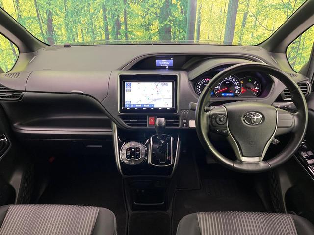 ヴォクシー ZS 煌II 後席モニター 純正9型ナビ 両側電動ドア 衝突軽減 バックカメラ クルコン コーナーセンサー LEDヘッド ETC リアオートエアコン オートハイビーム 車線逸脱警報 オートライト 純正16インチAW(2枚目)