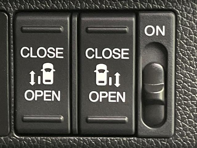 フリードハイブリッド ハイブリッド・Gホンダセンシング 両側電動ドア 純正9型ナビ バックカメラ アダプティブクルーズ スマートキー ハーフレザーシート ETC 車線逸脱警報 オートライト オートエアコン 純正15インチAW 革巻きステアリング(3枚目)