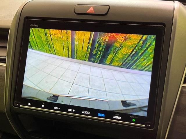フリードハイブリッド ハイブリッド・Gホンダセンシング 両側電動ドア 純正9型ナビ バックカメラ アダプティブクルーズ スマートキー ハーフレザーシート ETC 車線逸脱警報 オートライト オートエアコン 純正15インチAW 革巻きステアリング(5枚目)
