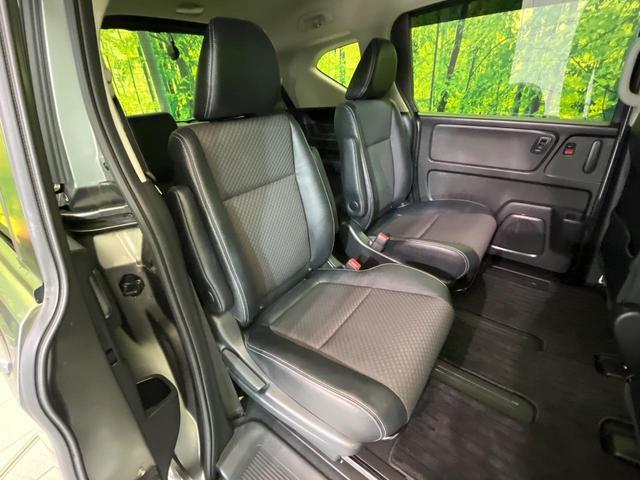 フリードハイブリッド ハイブリッド・Gホンダセンシング 両側電動ドア 純正9型ナビ バックカメラ アダプティブクルーズ スマートキー ハーフレザーシート ETC 車線逸脱警報 オートライト オートエアコン 純正15インチAW 革巻きステアリング(9枚目)